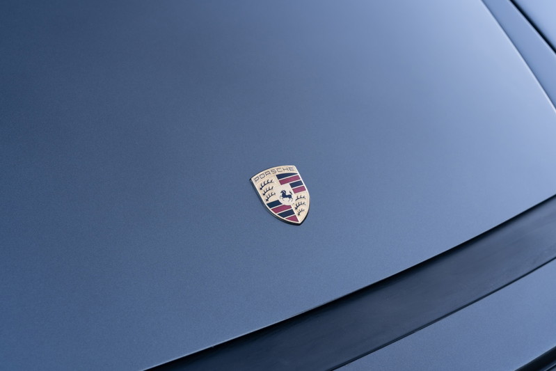 Slate Grey Metallic 1989 Porsche 930 Turbo Flachbau emblem on hood.