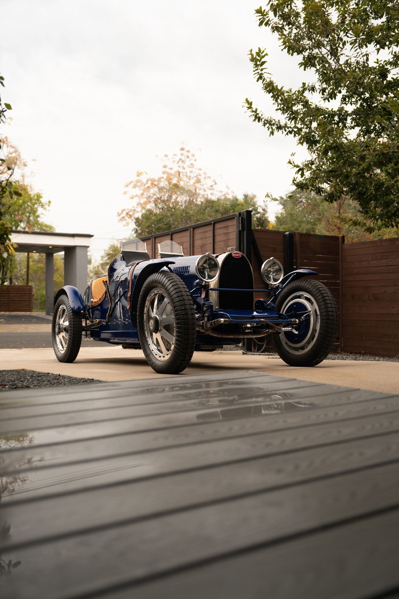 1927 Blue Bugatti Type 35 Pur Sang with spoked rims and leather trim.