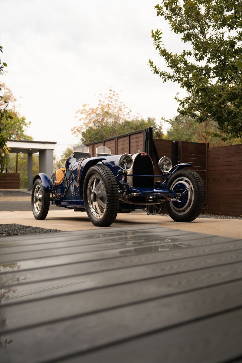 1927 Blue Bugatti Type 35 Pur Sang with spoked rims and leather trim.