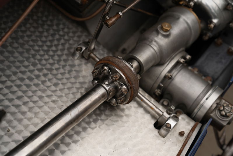 Close-up of the U-joint and driveshaft on a blue 1927 Bugatti Type 35 Pur Sang.