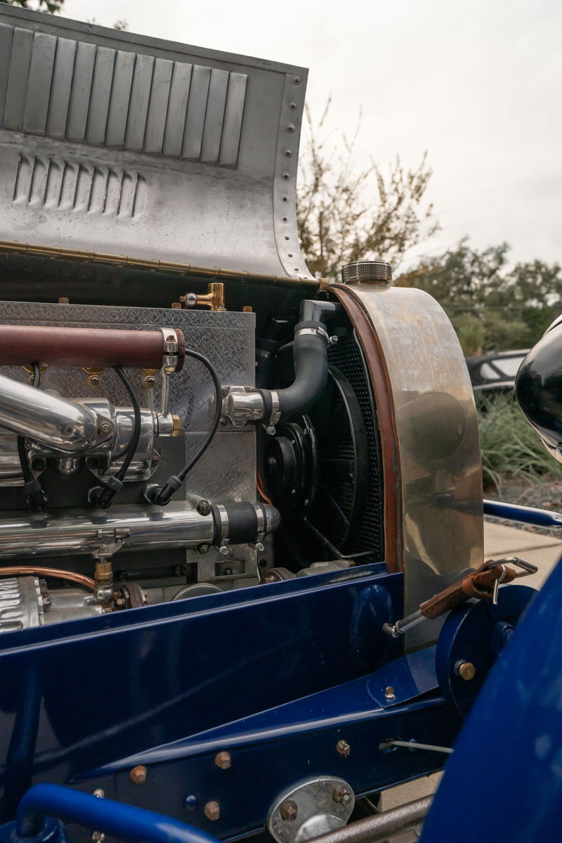 1927 Bugatti Type 35 engine bay with polished chrome and a blue chassis.