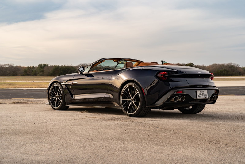 Dark blue 2018 Aston Martin Vanquish Zagato Volante convertible, tan interior, multi-spoke black rims.