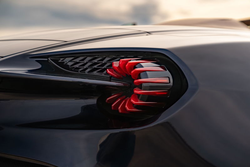 Close-up of an Aston Martin Vanquish Zagato's signature red taillight with black trim.
