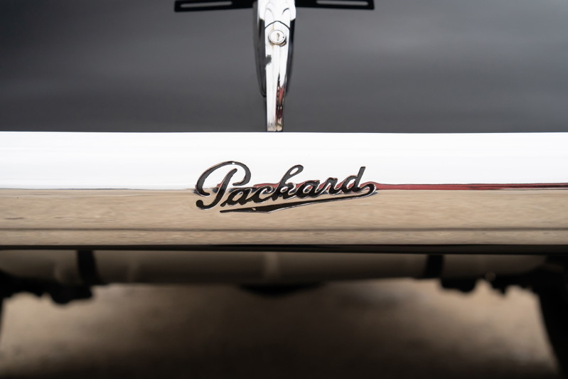 Packard Super Eight One Eighty emblem on chrome trim.