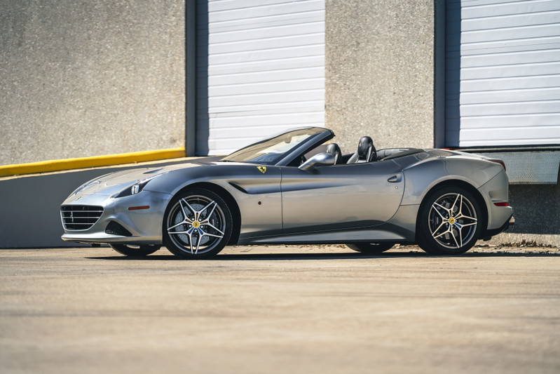 2016 silver Ferrari California T convertible with star-design rims.