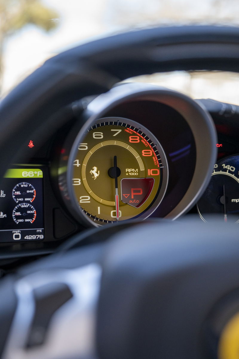 Ferrari California T dashboard showing RPM, speed, and gear selection.