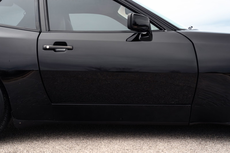 Black 1986 Porsche 944 Turbo door and side trim.