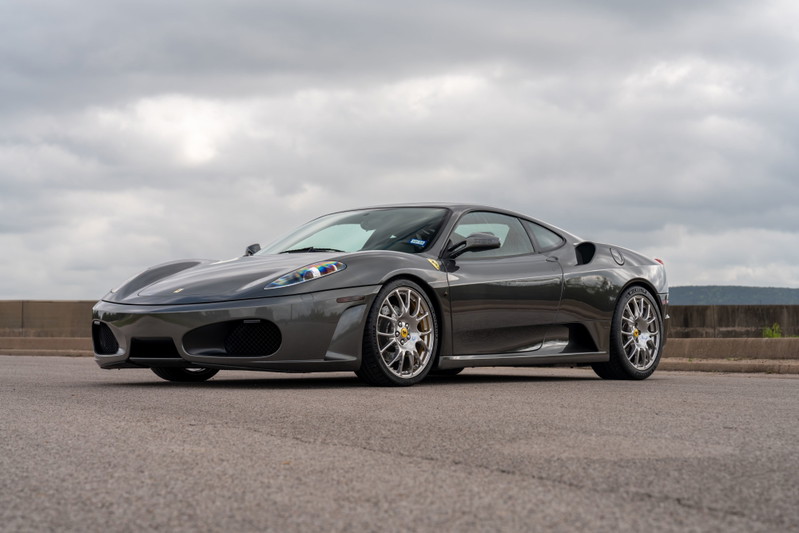 2007 Ferrari F430 in Grigio Silverstone with silver multi-spoke rims.