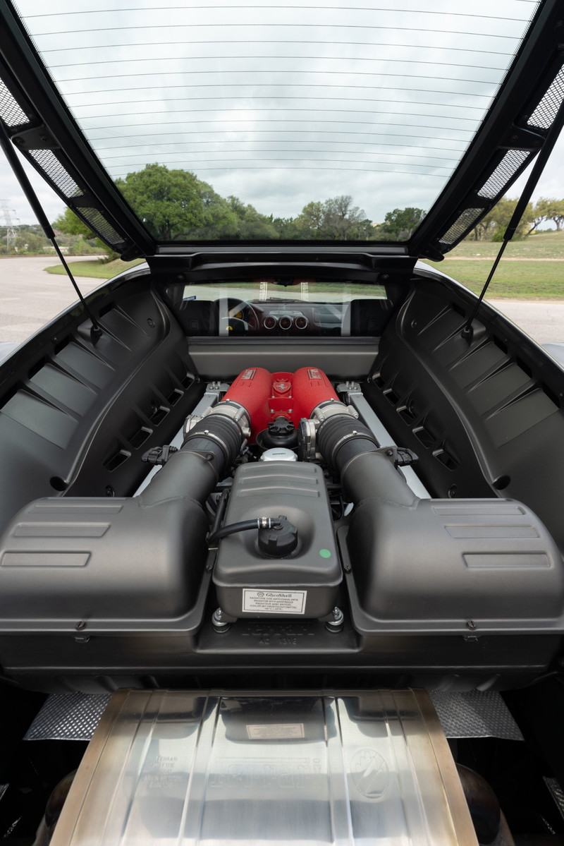 2007 Ferrari F430 6-speed engine bay. Grigio Silverstone paint. V8 engine with red intake manifolds.