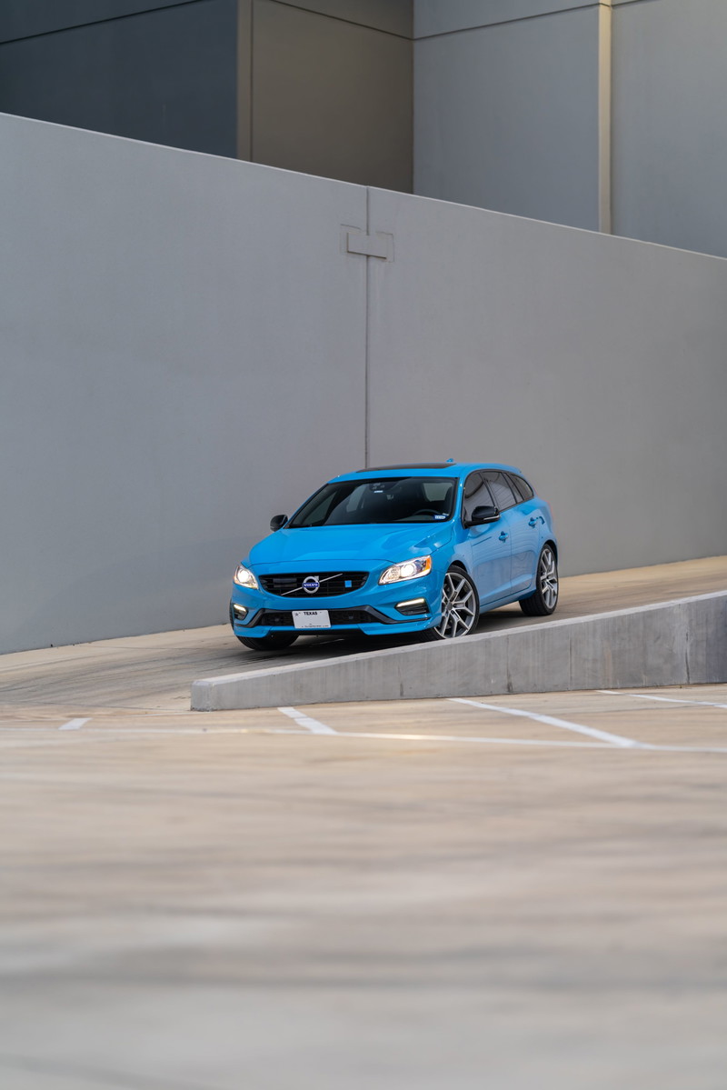 2015 Volvo V60 Polestar in Rebel Blue, with unique alloy rims and black trim.