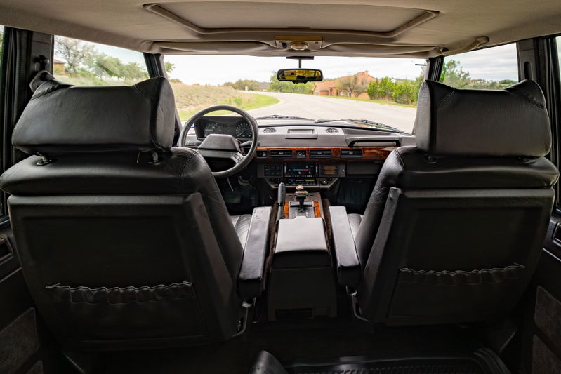 1994 Land Rover Range Rover County LWB interior, dashboard, leather seats, wood trim, center console.