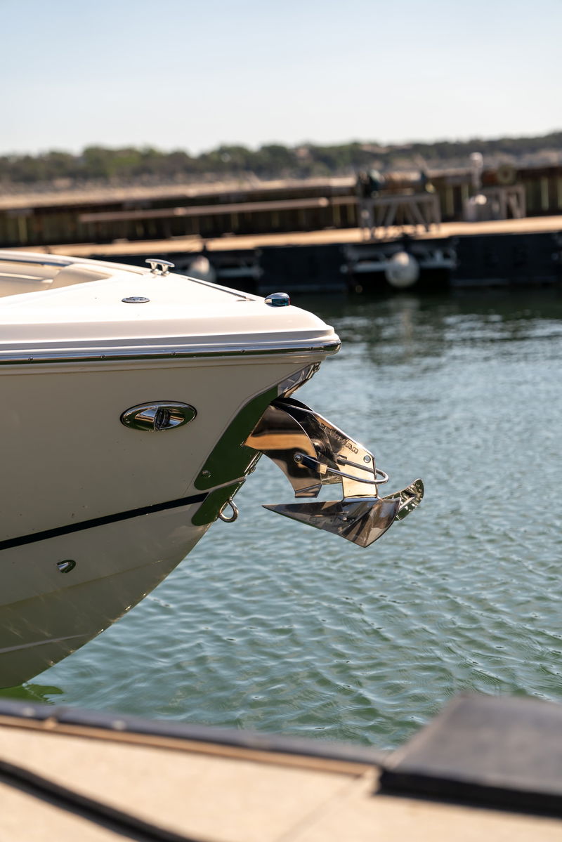 Cobalt R7 Surf bow with polished stainless steel anchor and chrome trim.