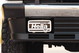 1995 Range Rover County with Hella Comet 550 fog lights and aggressive off-road tires.