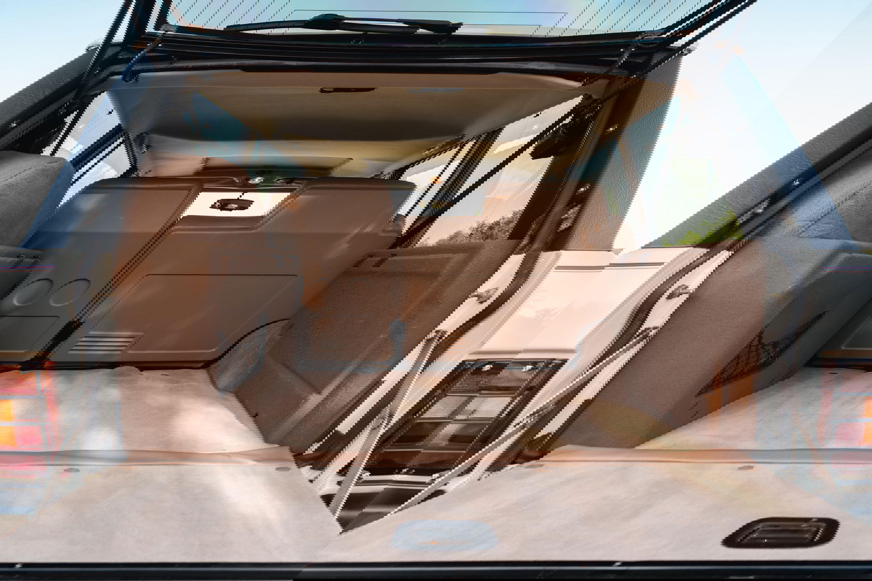 1995 white Land Rover Range Rover County rear cargo area.