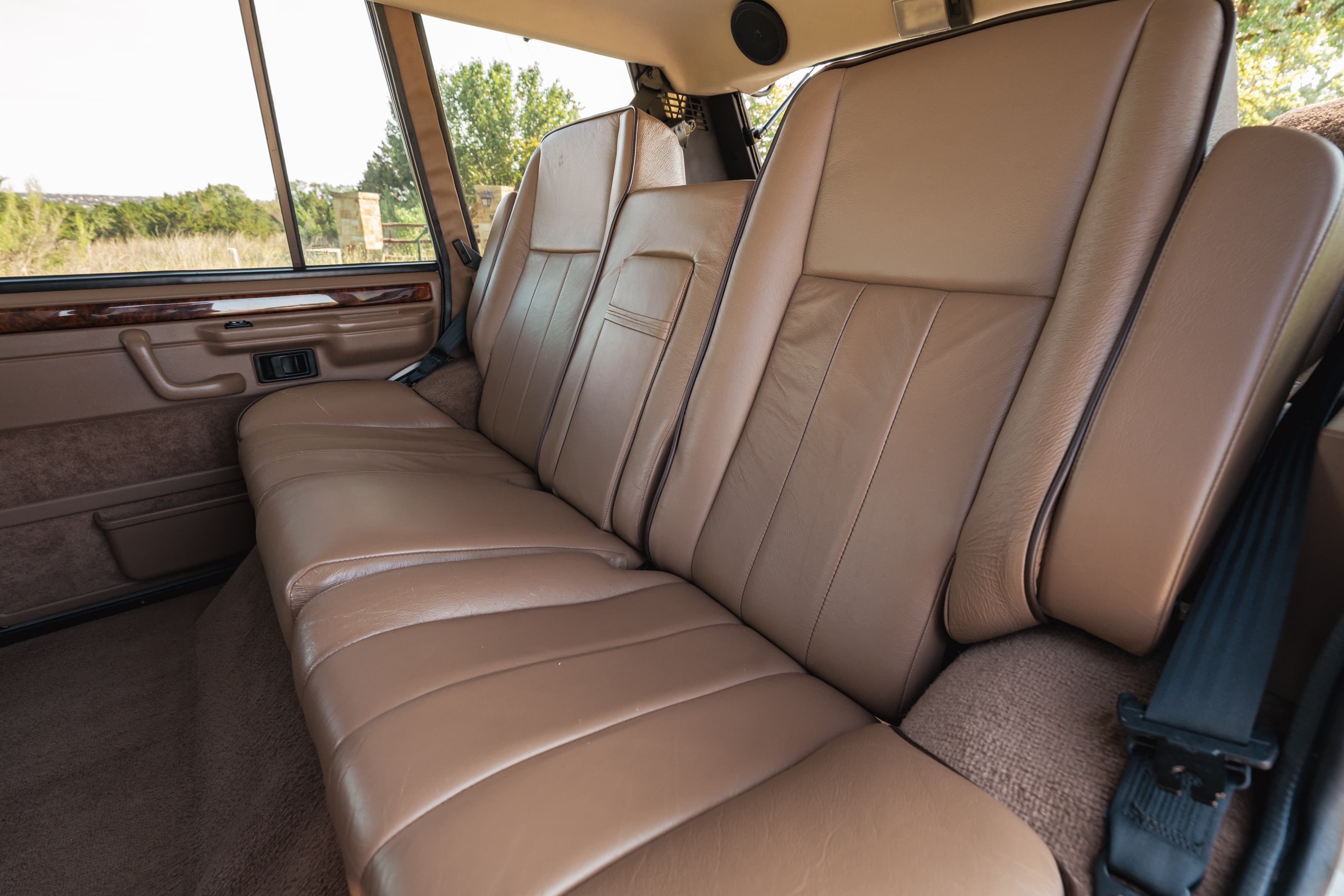 1995 white Range Rover County rear tan leather seats.