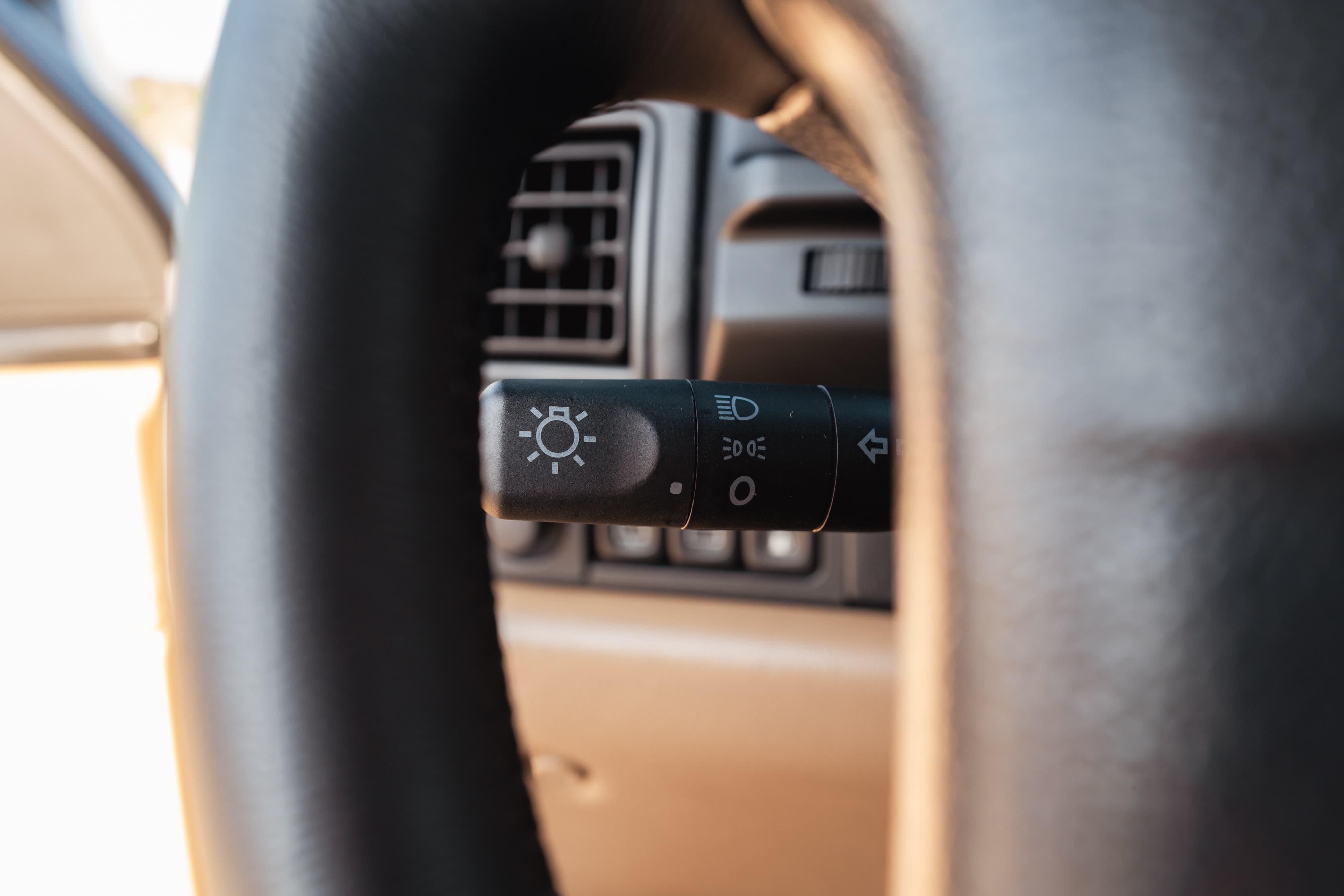 1995 Land Rover Range Rover County headlight stalk and dashboard detail.