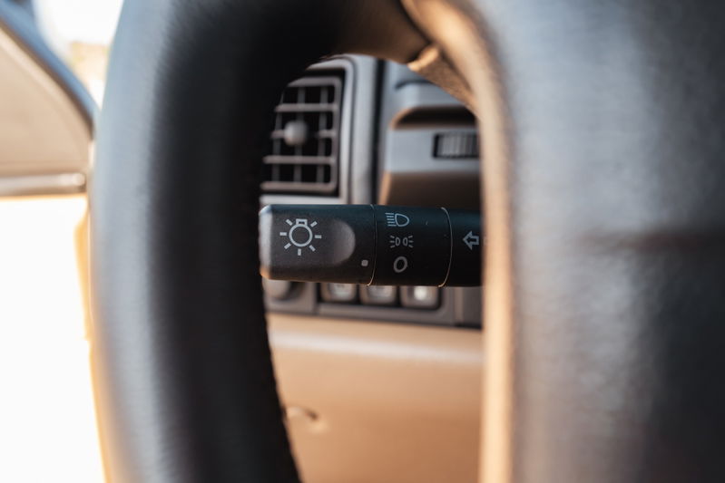1995 Land Rover Range Rover County headlight stalk and dashboard detail.
