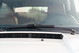 1995 white Land Rover Range Rover County windshield with wiper arm and hood vent.