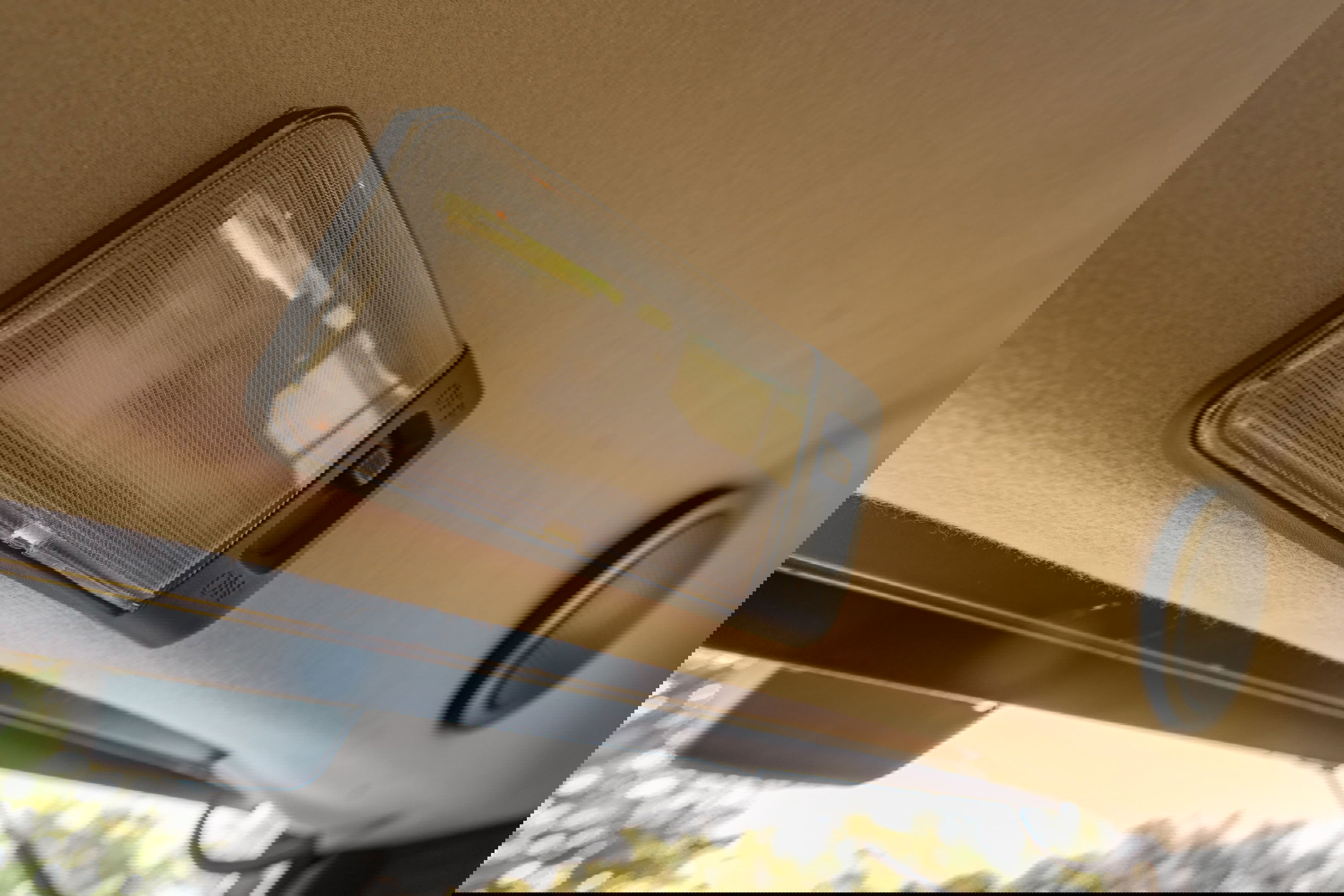 Interior dome light with ON/OFF switch on a 1995 white Land Rover Range Rover County.