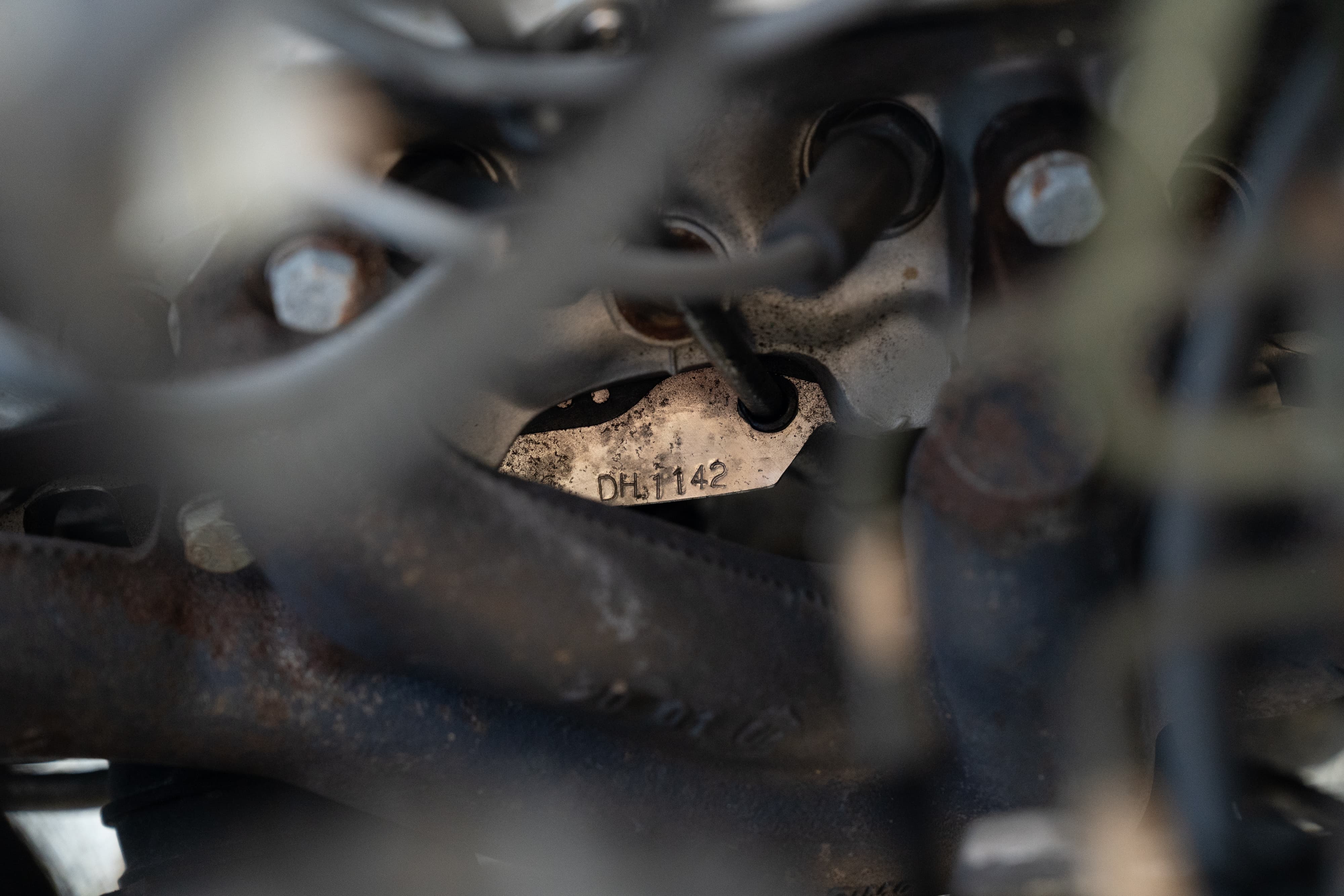 White 1995 Land Rover Range Rover County with VIN tag &quot;DH1142&quot; visible in engine bay.