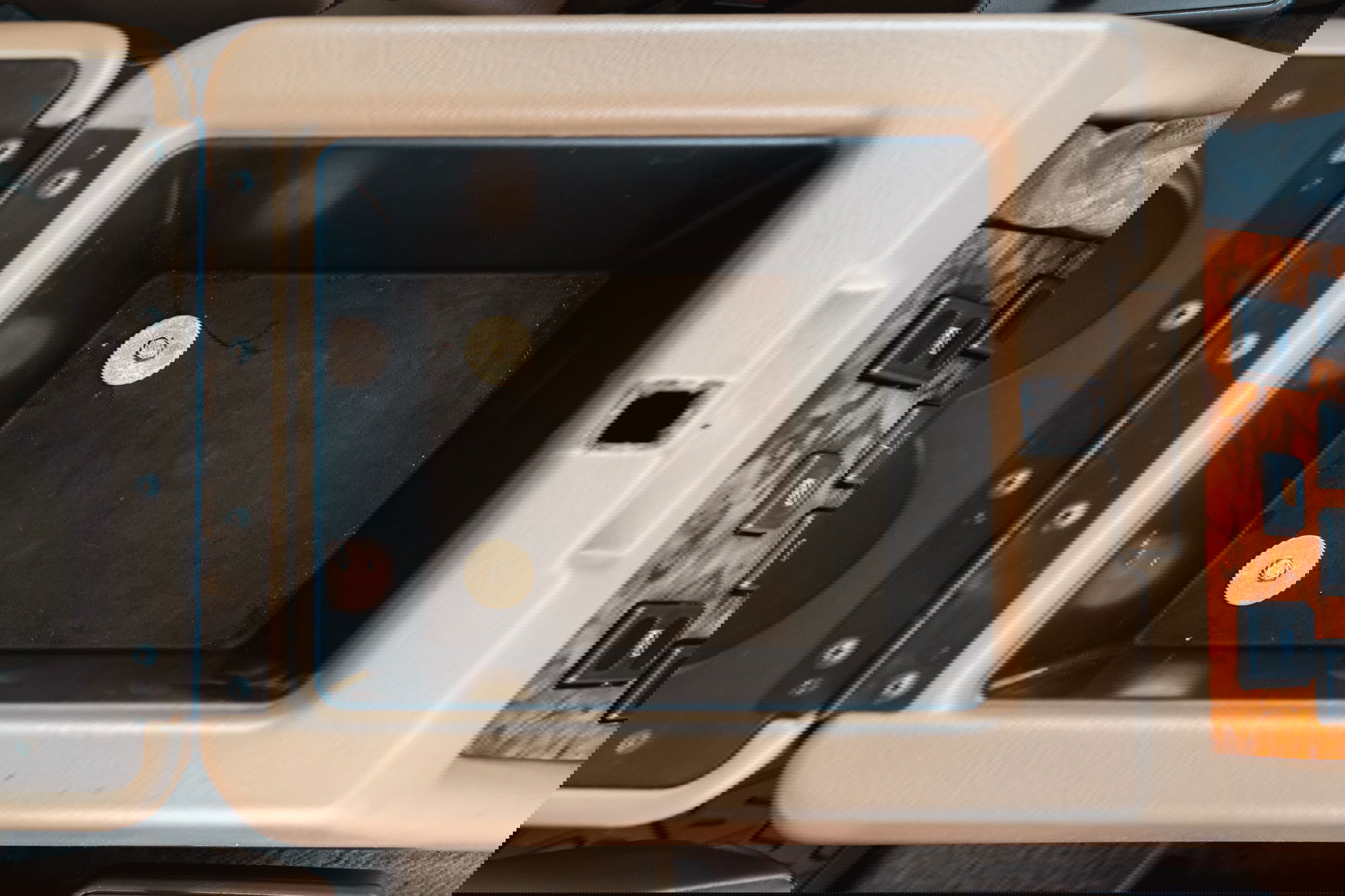 1995 White Land Rover Range Rover County center console with wood trim.