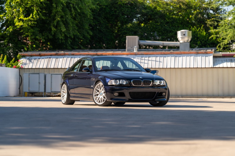 2002 BMW M3 in Carbon Black. Features silver multi-spoke rims and sleek, sporty body trim.