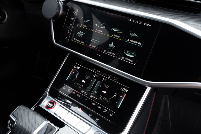 2022 Audi RS6 in Nardo Grey with touch screen climate and infotainment controls.