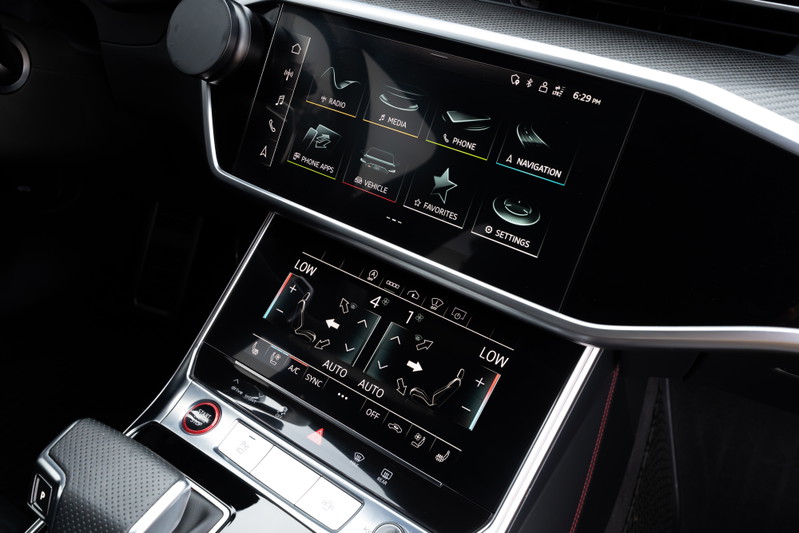 2022 Audi RS6 in Nardo Grey with touch screen climate and infotainment controls.