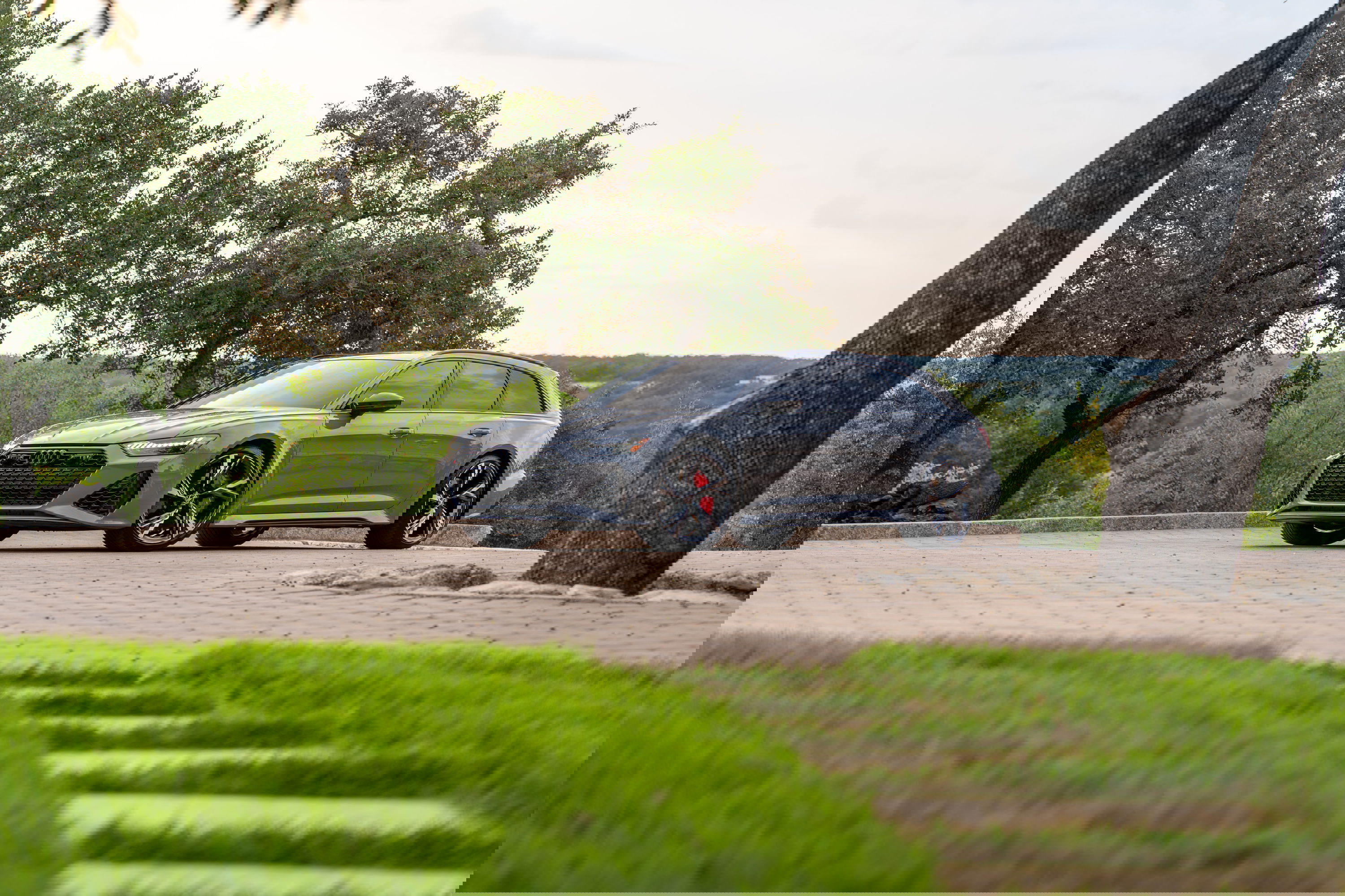 Nardo Grey 2022 Audi RS6 Avant with black wheels and red brake calipers.