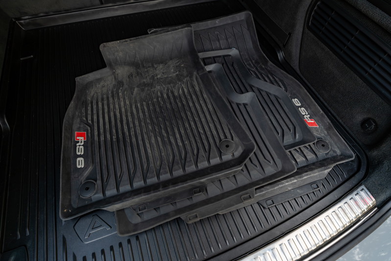 Black Audi RS6 all-weather floor mats with red RS 6 livery in Nardo Grey.