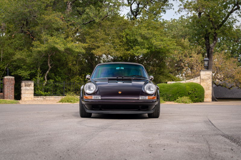 Aubergine Metallic 1990 Singer Porsche 911 front view.