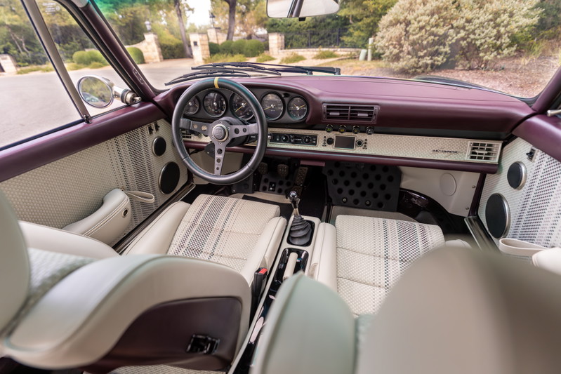 Aubergine Metallic 1990 Singer 911 interior: houndstooth seats, leather trim, rally steering wheel.