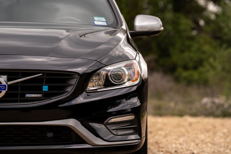 Front view of a black 2015 Volvo V60 R-Design Polestar with unique grille badging and headlights.