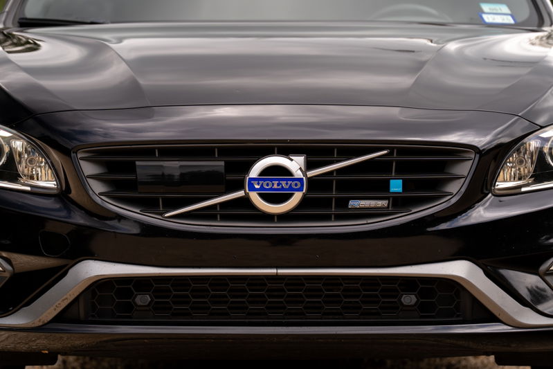 Front view of a black 2015 Volvo V60 R-Design Polestar, showing the grille and headlights.