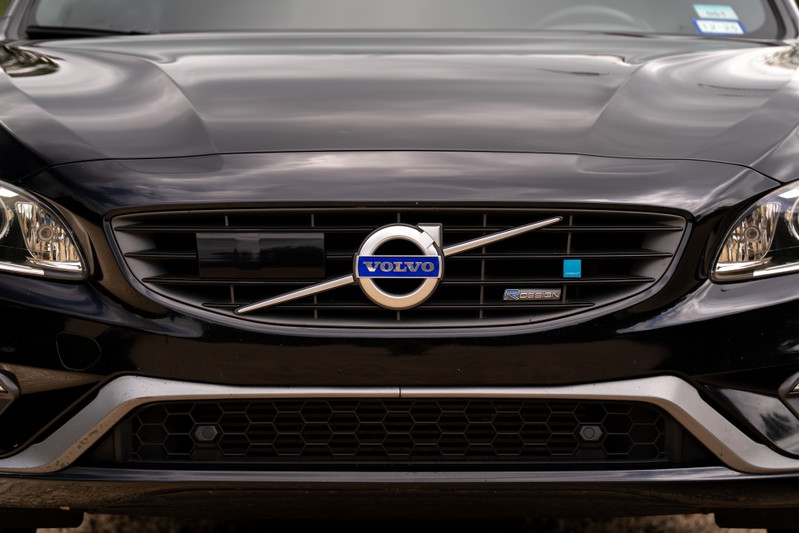 Front view of a black 2015 Volvo V60 R-Design Polestar, showing the grille and headlights.