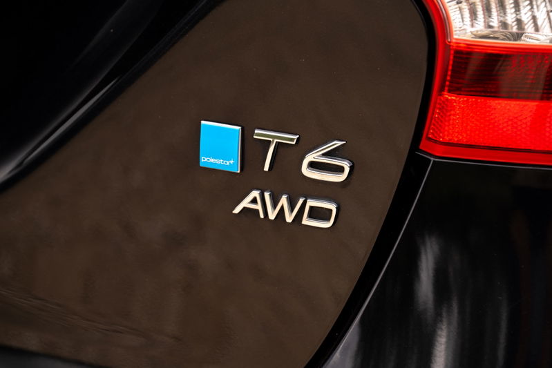 2015 Volvo V60 Polestar T6 AWD badge on black paint.