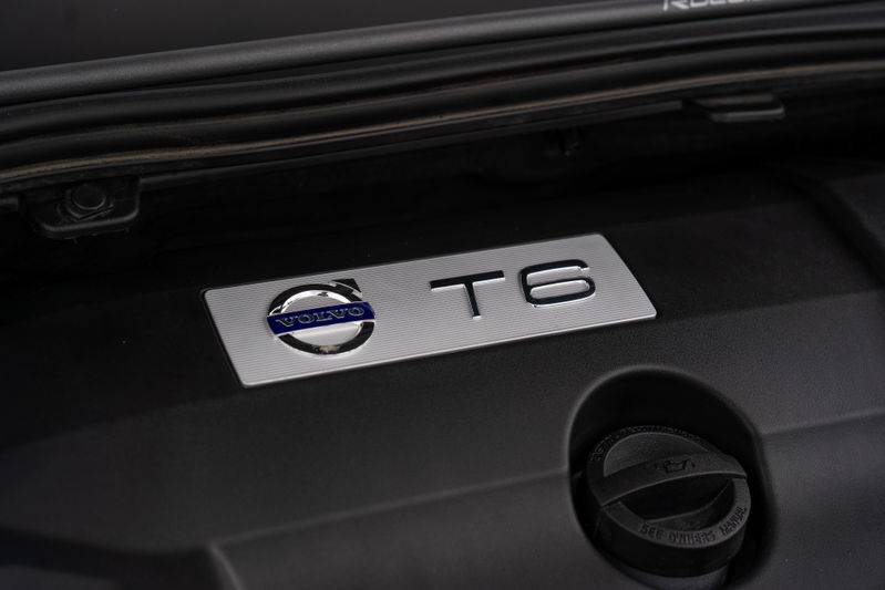 Volvo V60 T6 Polestar engine bay badge with carbon fiber trim.