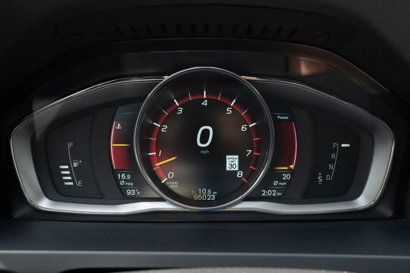 Digital dashboard of a black 2015 Volvo V60 R-Design Polestar, displaying speed, fuel, and ODO.