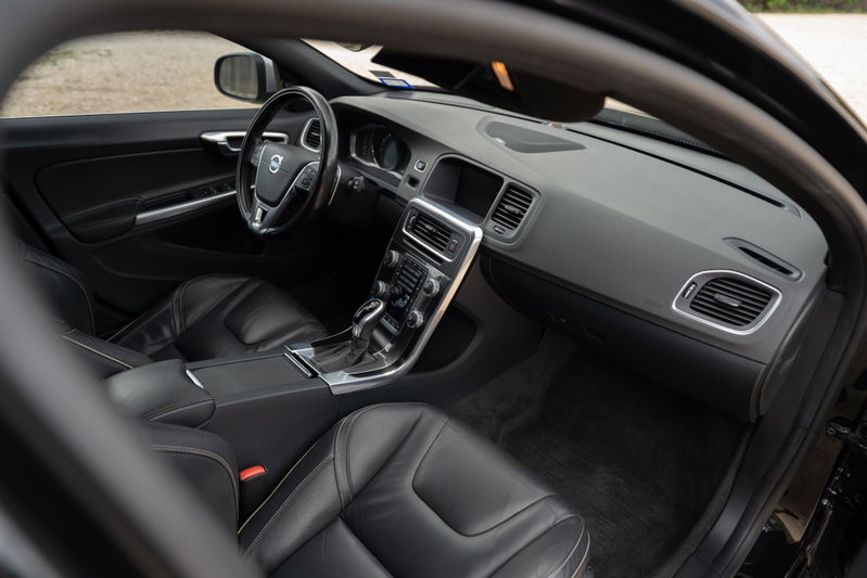 2015 Volvo V60 R-Design Polestar interior. Black leather seats, dashboard, center console.