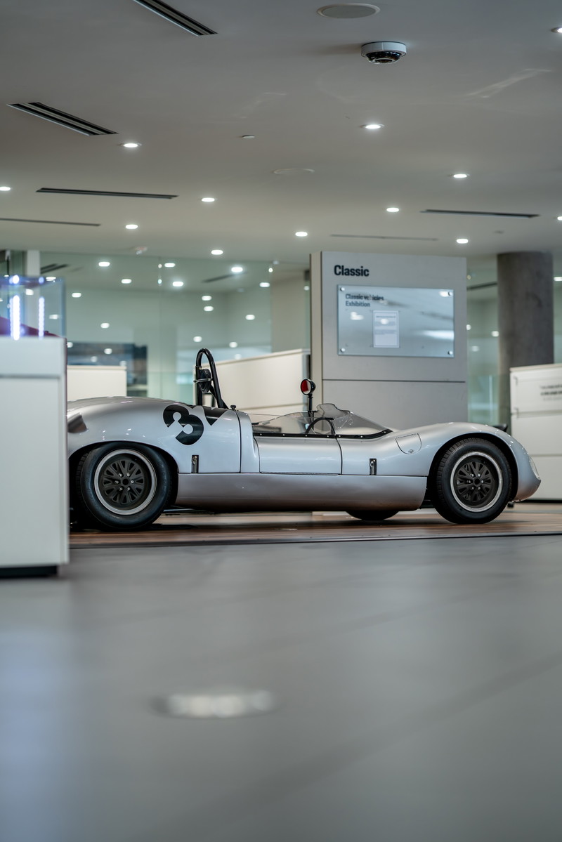 1964 Elva Porsche 4-cam race car, silver with black racing number '3' livery.