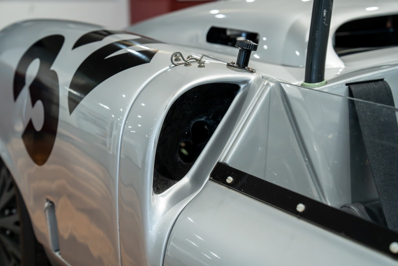 1964 Elva Porsche 4-Cam race car in silver with black '36' livery and a rear air intake.