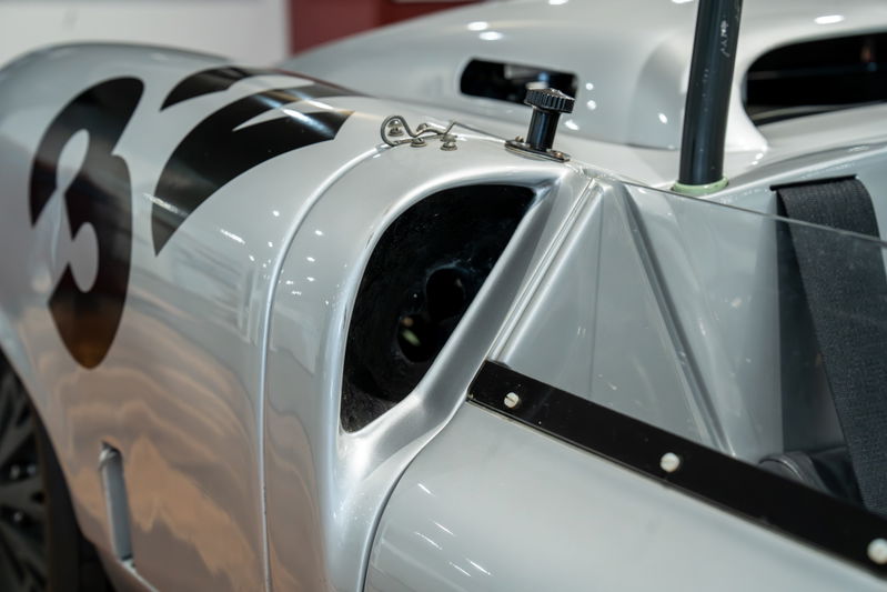 1964 Elva Porsche 4-Cam race car in silver with black '36' livery and a rear air intake.