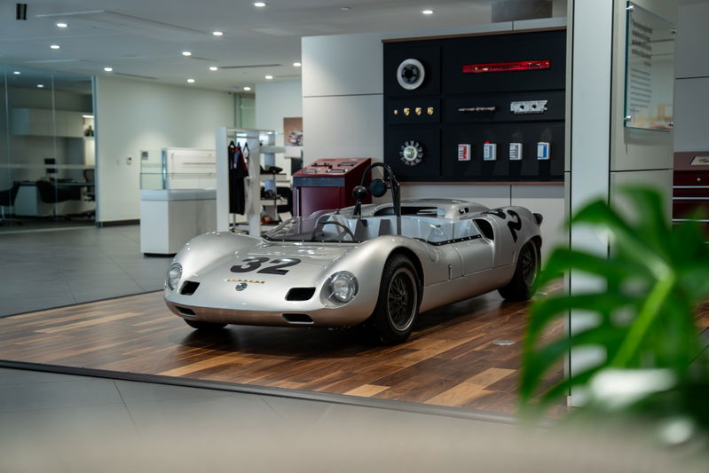 1964 Elva Porsche 4 Cam race car, silver, number 32 livery, classic rims.