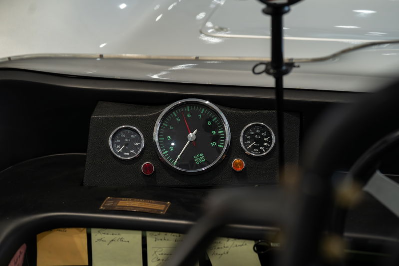 1964 Elva Porsche 4-Cam dashboard with tachometer and oil pressure gauges.