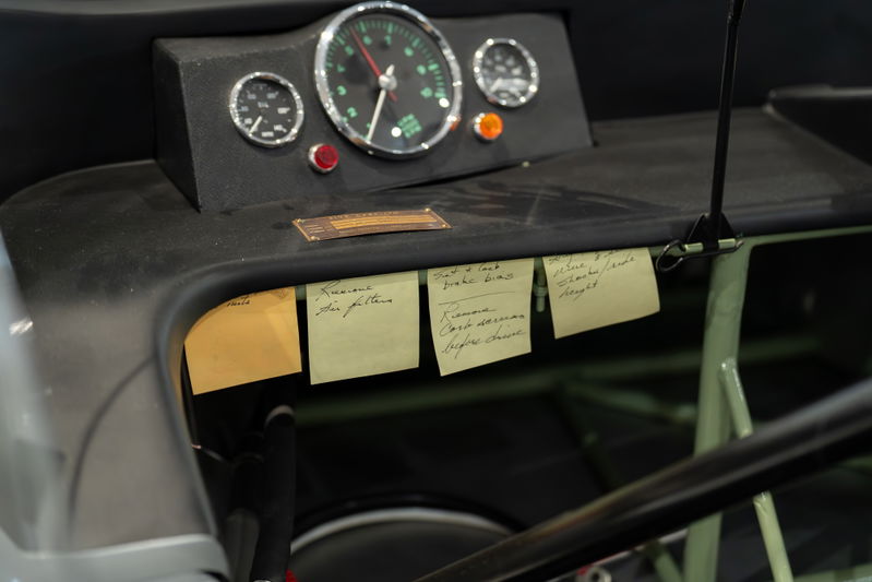 Interior of a 1964 Elva Porsche 4-Cam with notes on the dash.