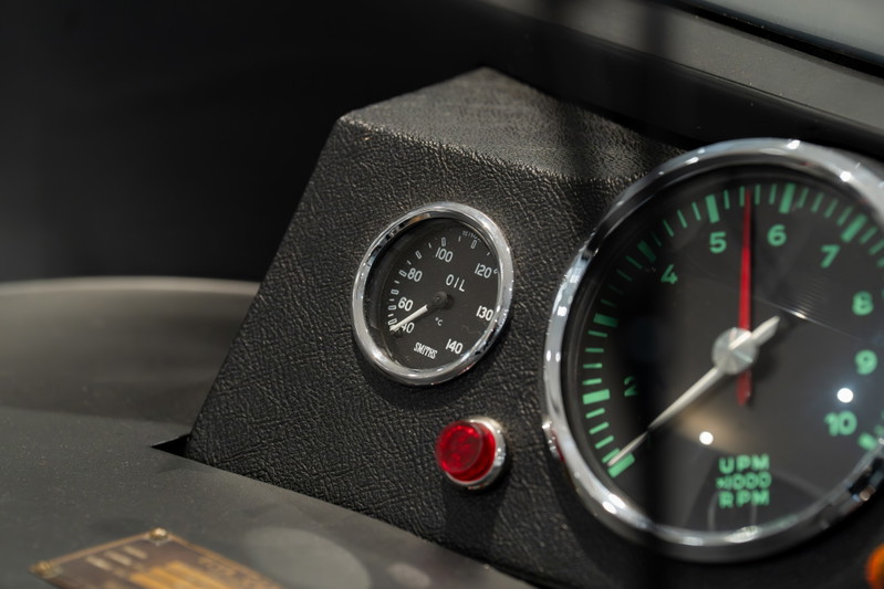 Classic dashboard with Smiths oil gauge and tachometer in a 1964 Elva Porsche 4-Cam.
