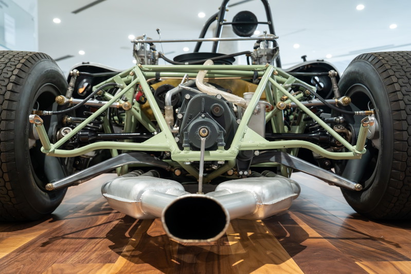 1964 Elva Porsche 4-Cam rear view, showing chassis, suspension, exhaust, and tire.