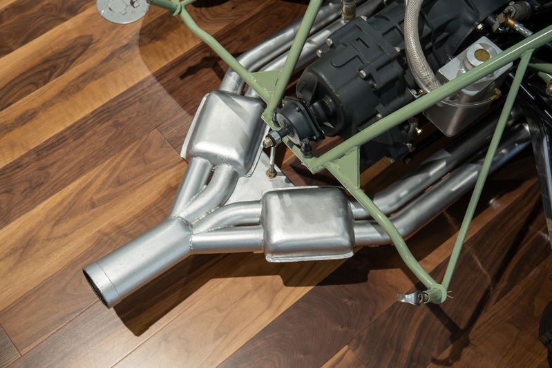 1964 Elva Porsche 4-cam engine with stainless steel exhaust headers and mufflers.
