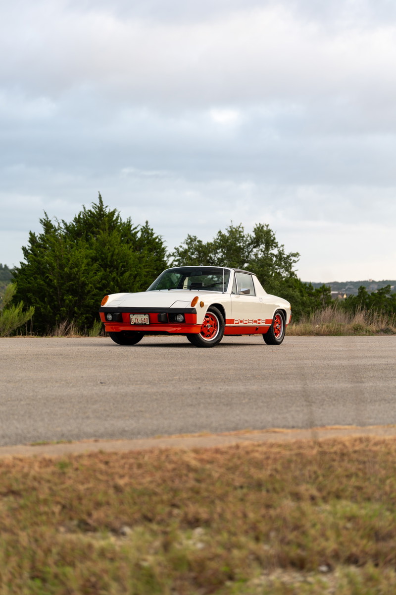 1974 Porsche 914 Can-Am LE in cream and orange. Features distinctive orange front bumper and side livery.