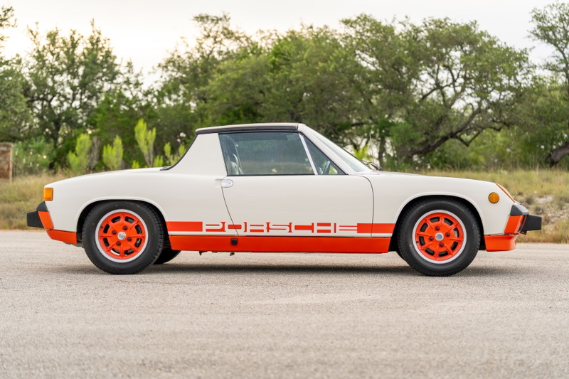 1974 Porsche 914 Can-Am with orange trim and rims.
